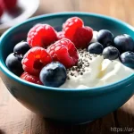 다이어트 중 먹을 수 있는 스낵 추천 - Fresh and Wholesome Breakfast Bowl**
A vibrant and aesthetically pleasing close-up shot of a nutriti...