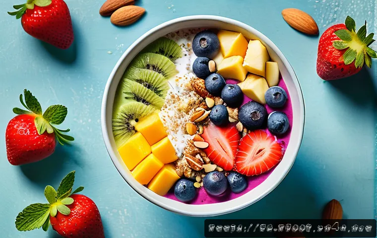 스무디 볼 만드는 법과 재료 추천 - A vibrant smoothie bowl topped with fresh seasonal fruits native to the Middle East, including slice...